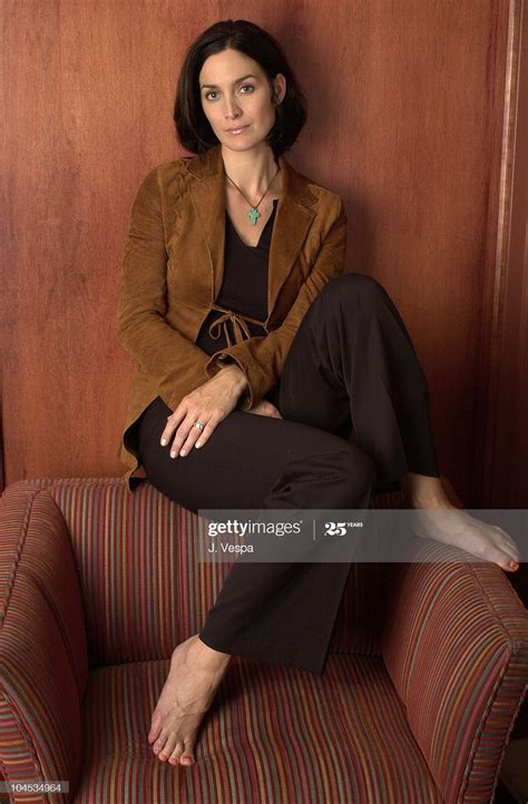 carrie anne moss feet